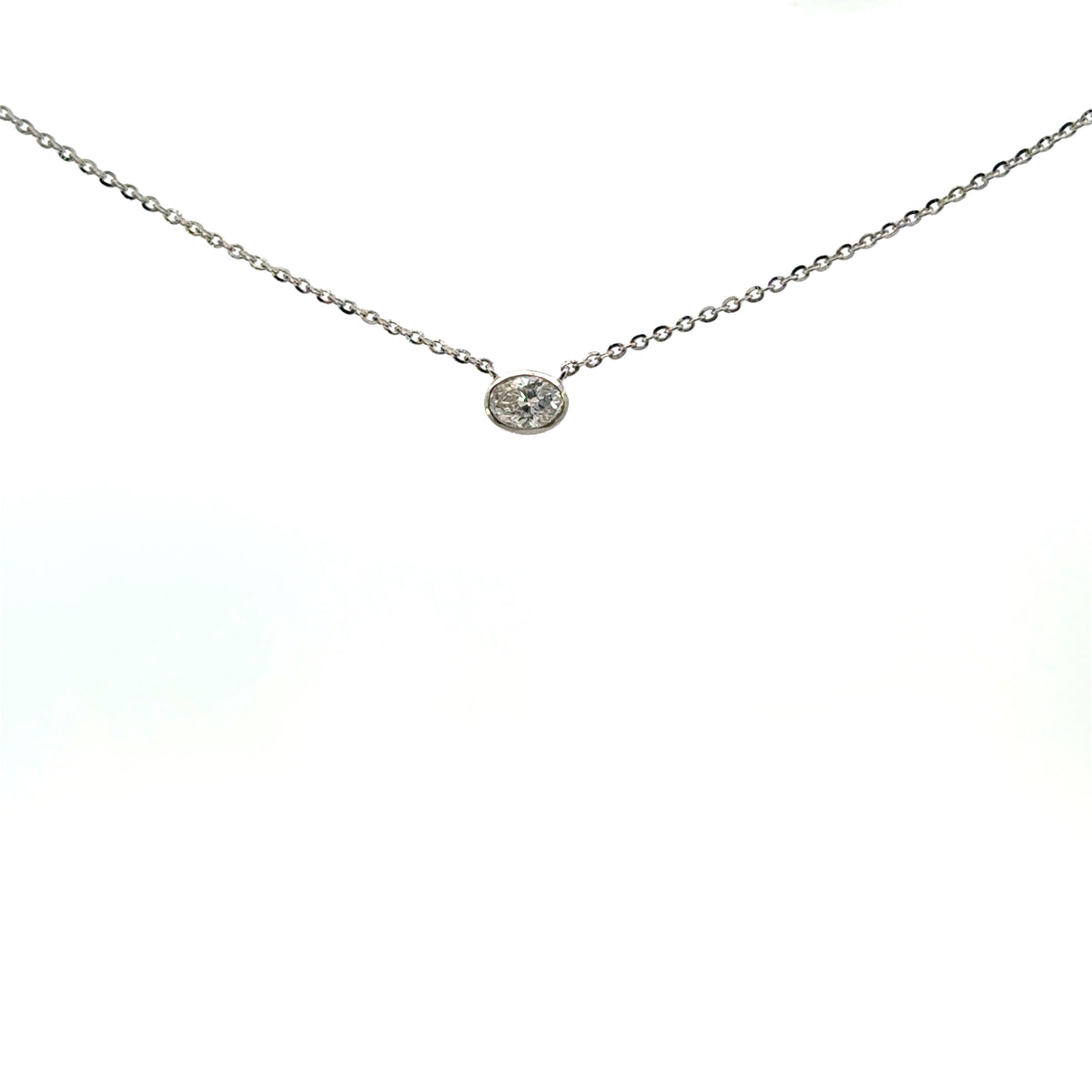 Floating diamond lab oval biselado oro blanco
