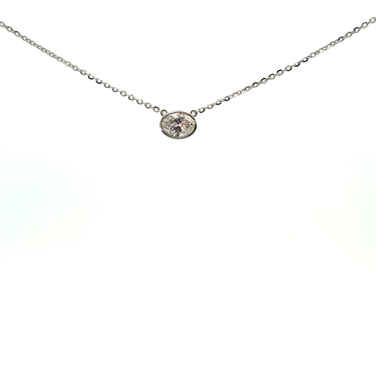 Floating diamond lab oval biselado oro blanco 1ct
