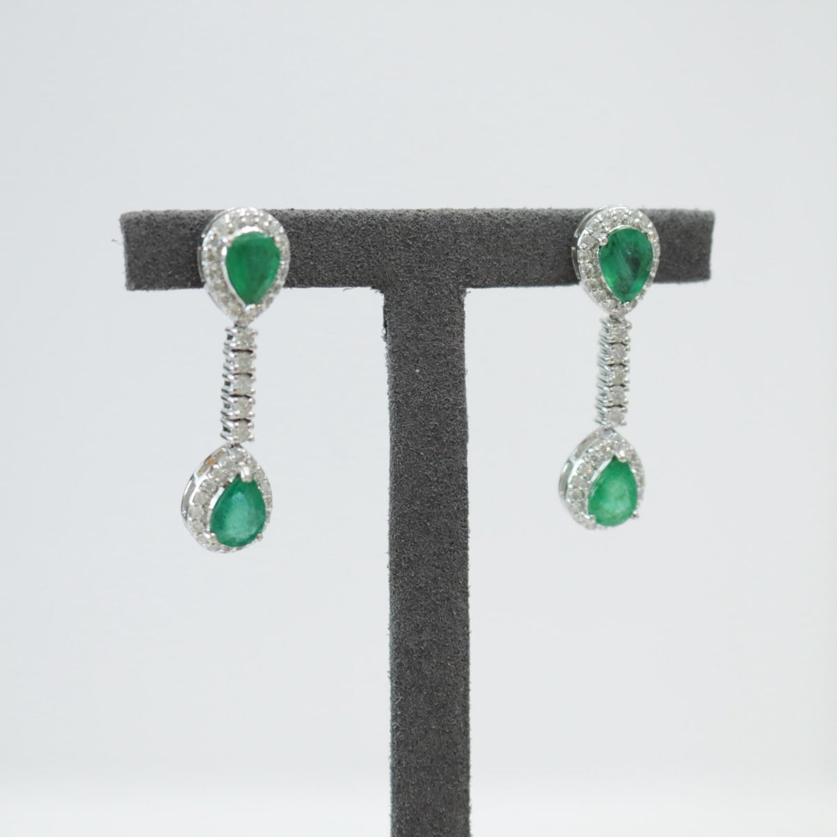 Aretes esmeralda gota colgantes y diamantes