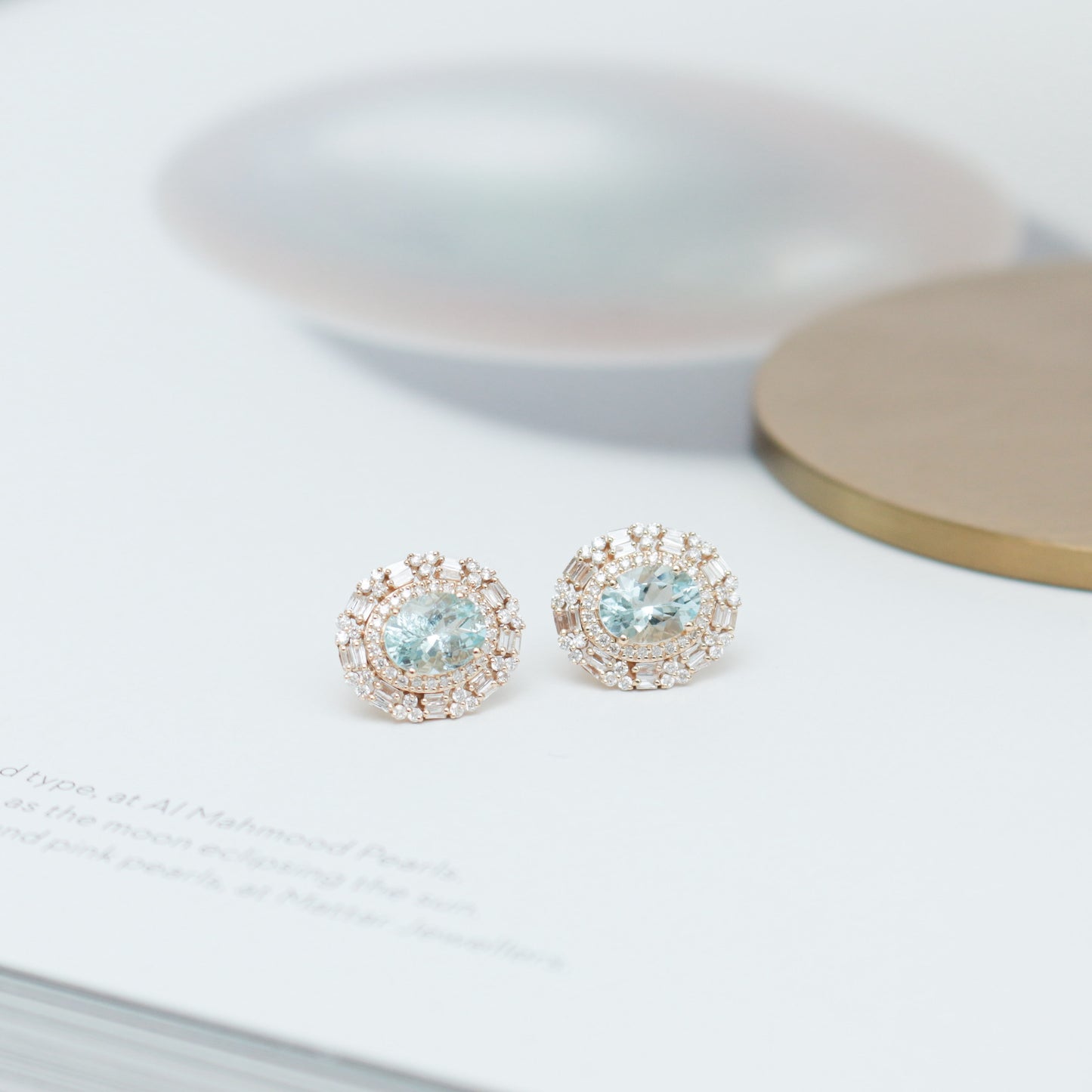 Anillo aguamarinas con halo de diamantes