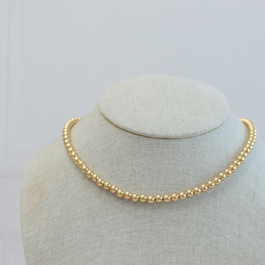 Ball gold necklace