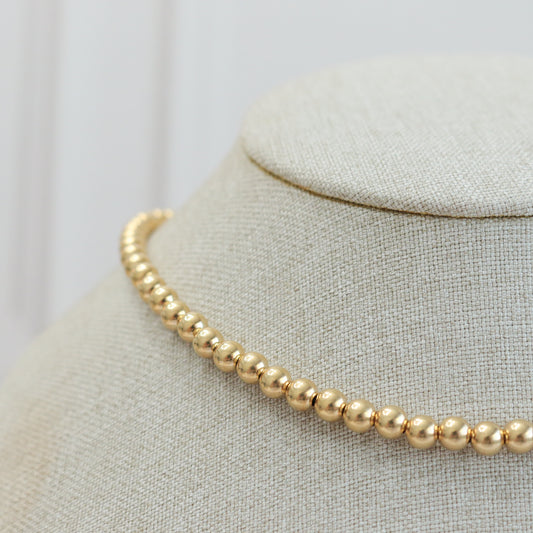 Ball gold necklace