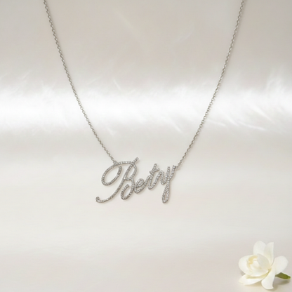 Name diamond necklace oro blanco