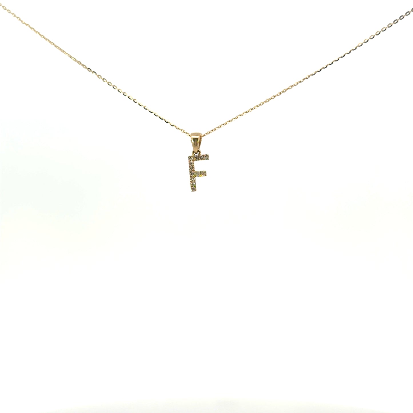 Inicial F oro amarillo