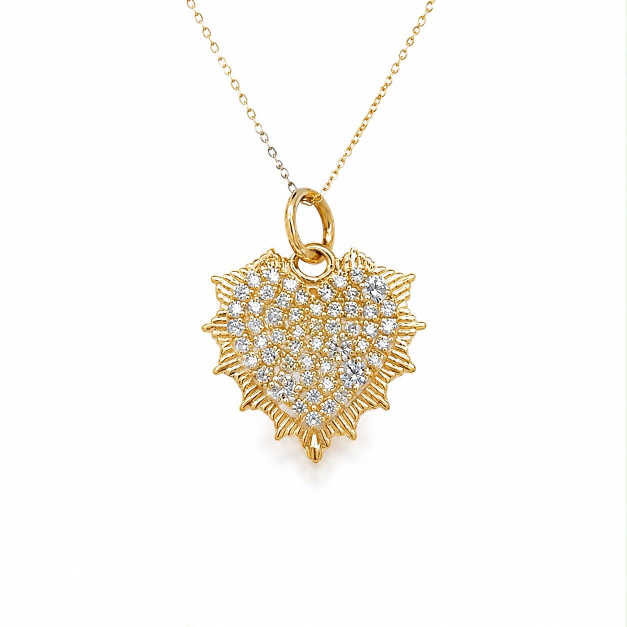 Dije de corazón pave con rayitos
