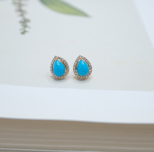 Aretes de turquesas en forma de gota con halo de diamantes